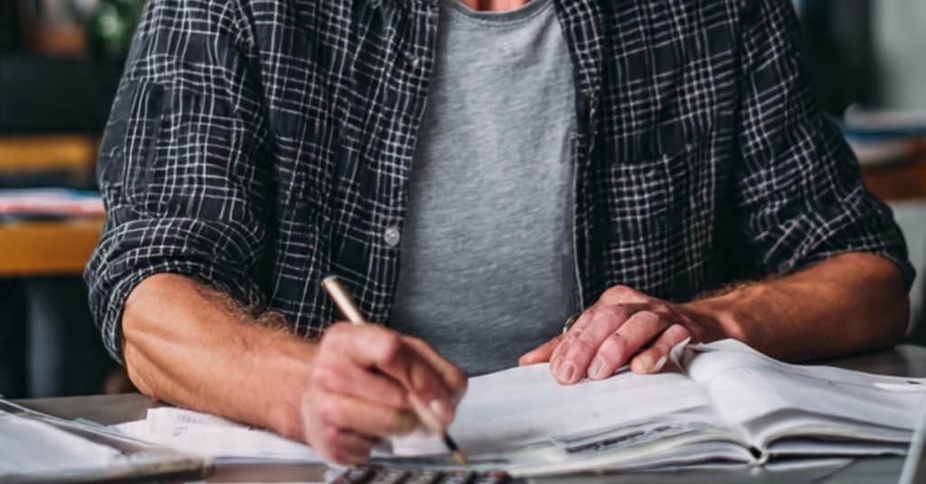 A beginner business owner learning accounting fundamentals and bookkeeping