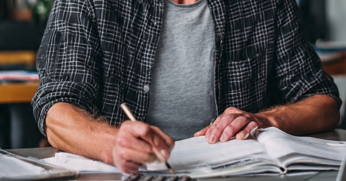 A beginner business owner learning accounting fundamentals and bookkeeping