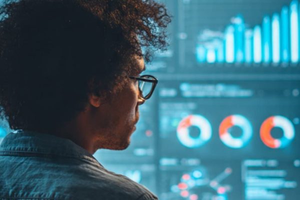 Digital marketer analyzing data to run digital marketing campaigns